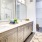 a bathroom with a large mirror