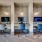 a room with chairs and televisions