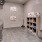 a room with a table and shelves